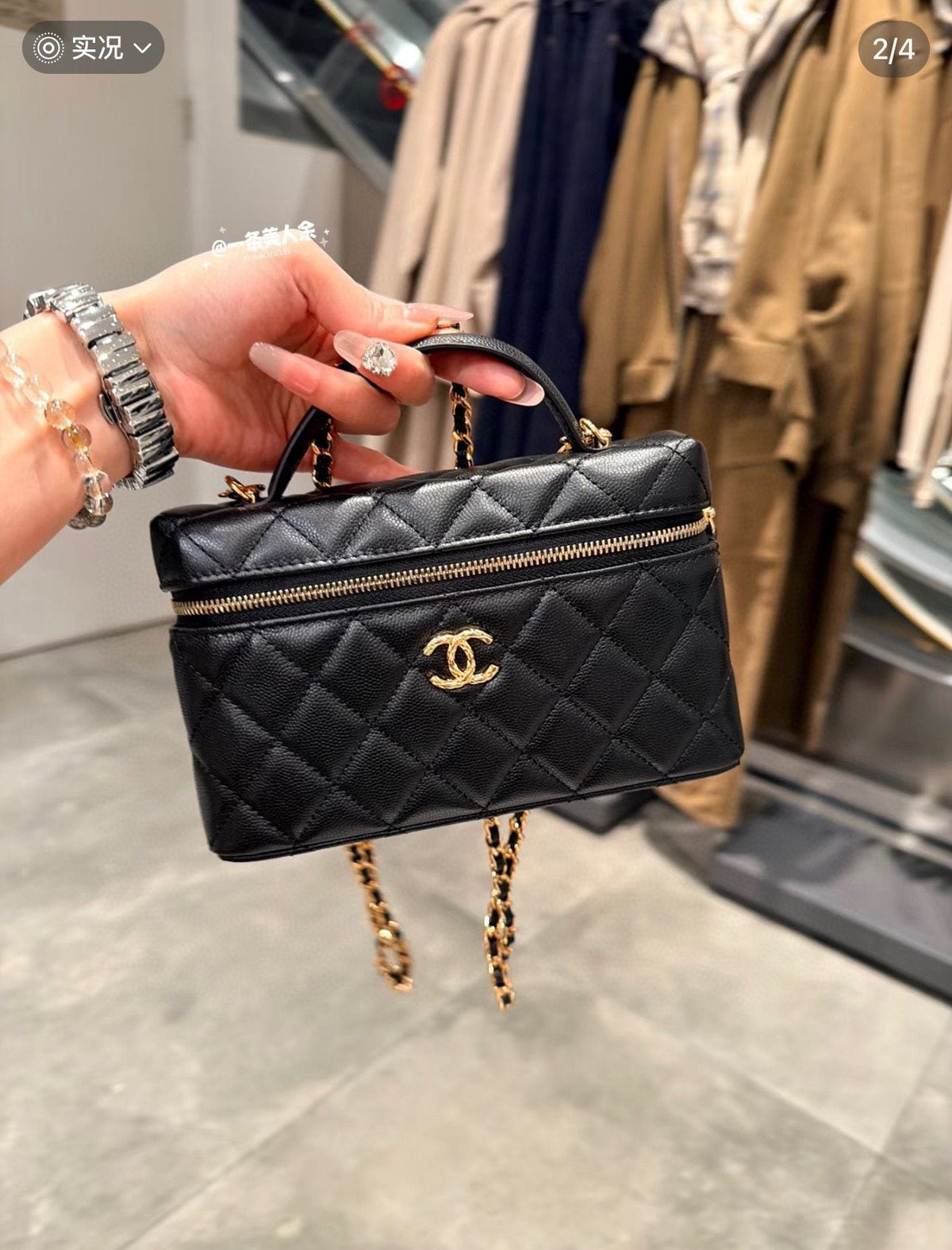 Chanel Quilted Vanity Top-Handle Bag — model