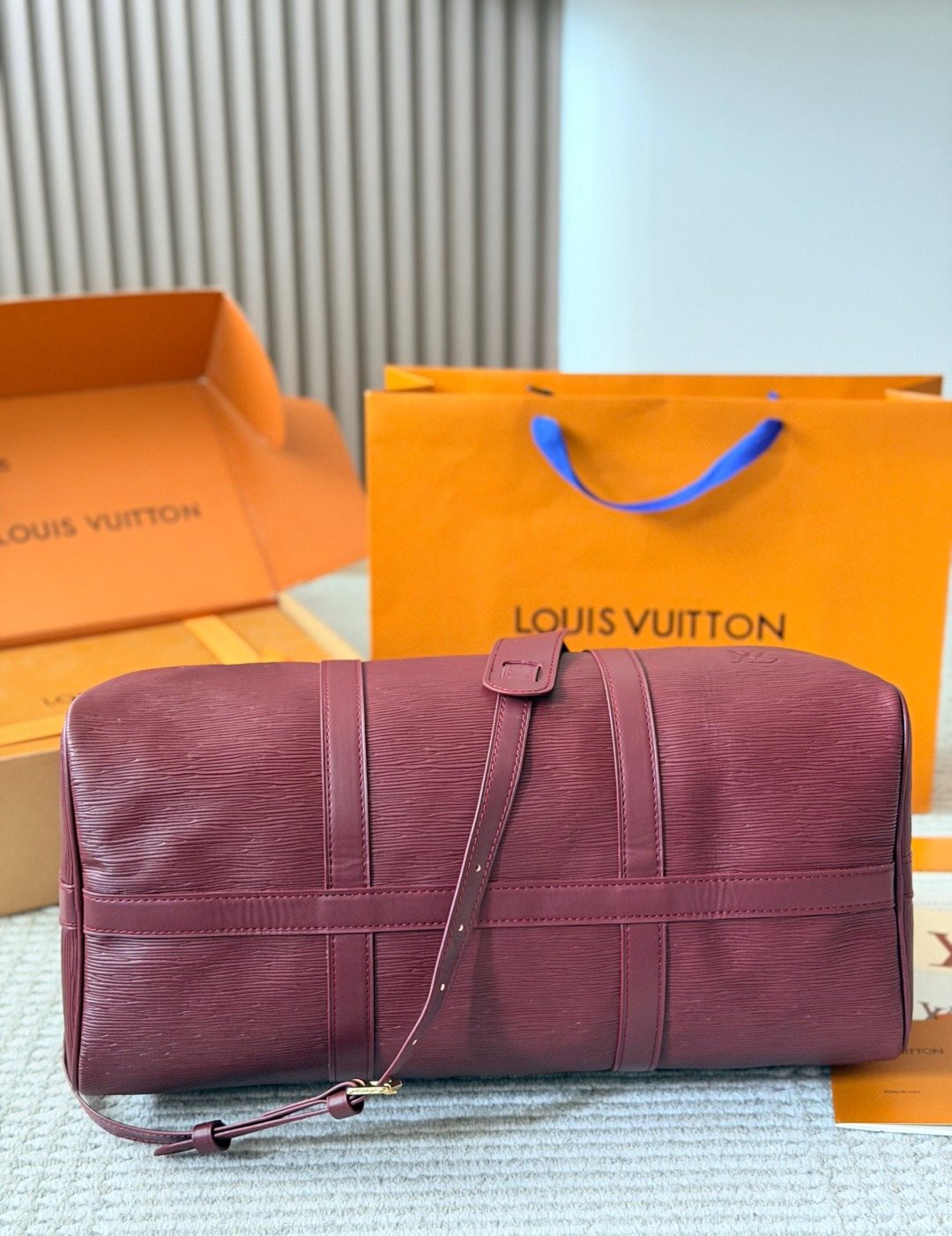 Louis Vuitton Keepall Burgundy Leather Travel Bag — detail