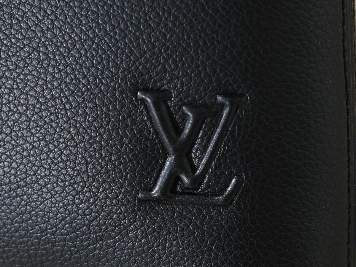 Louis Vuitton Takeoff Leather Wristlet Clutch — detail