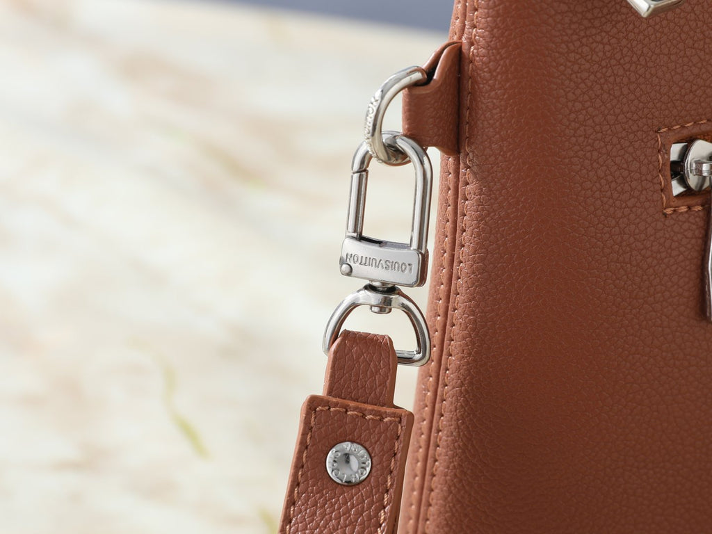 Louis Vuitton Takeoff Leather Wristlet Clutch — detail