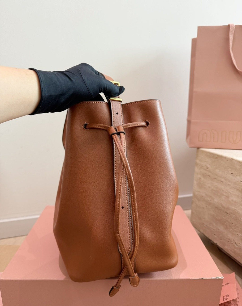 Miu Miu Smooth Leather Drawstring Bucket Bag — side