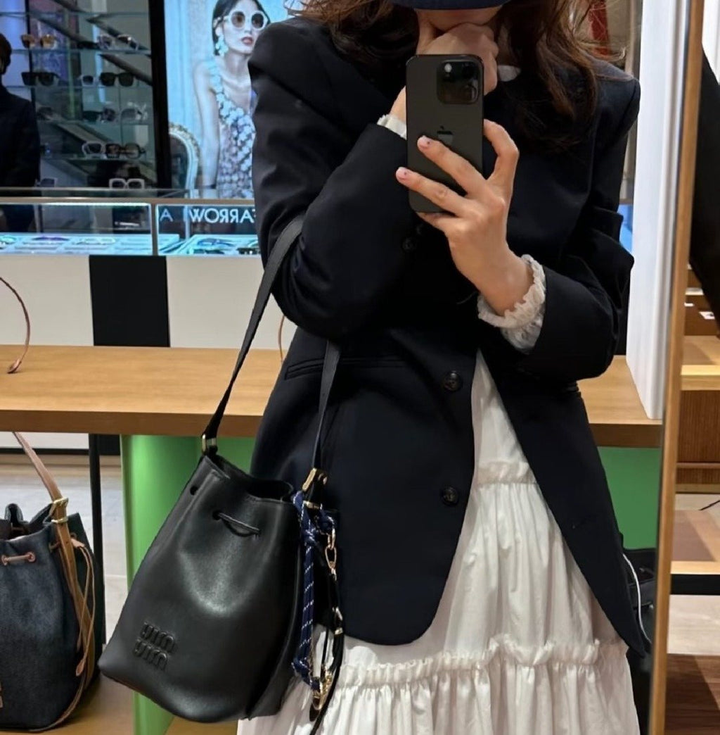 Miu Miu Smooth Leather Drawstring Bucket Bag — model