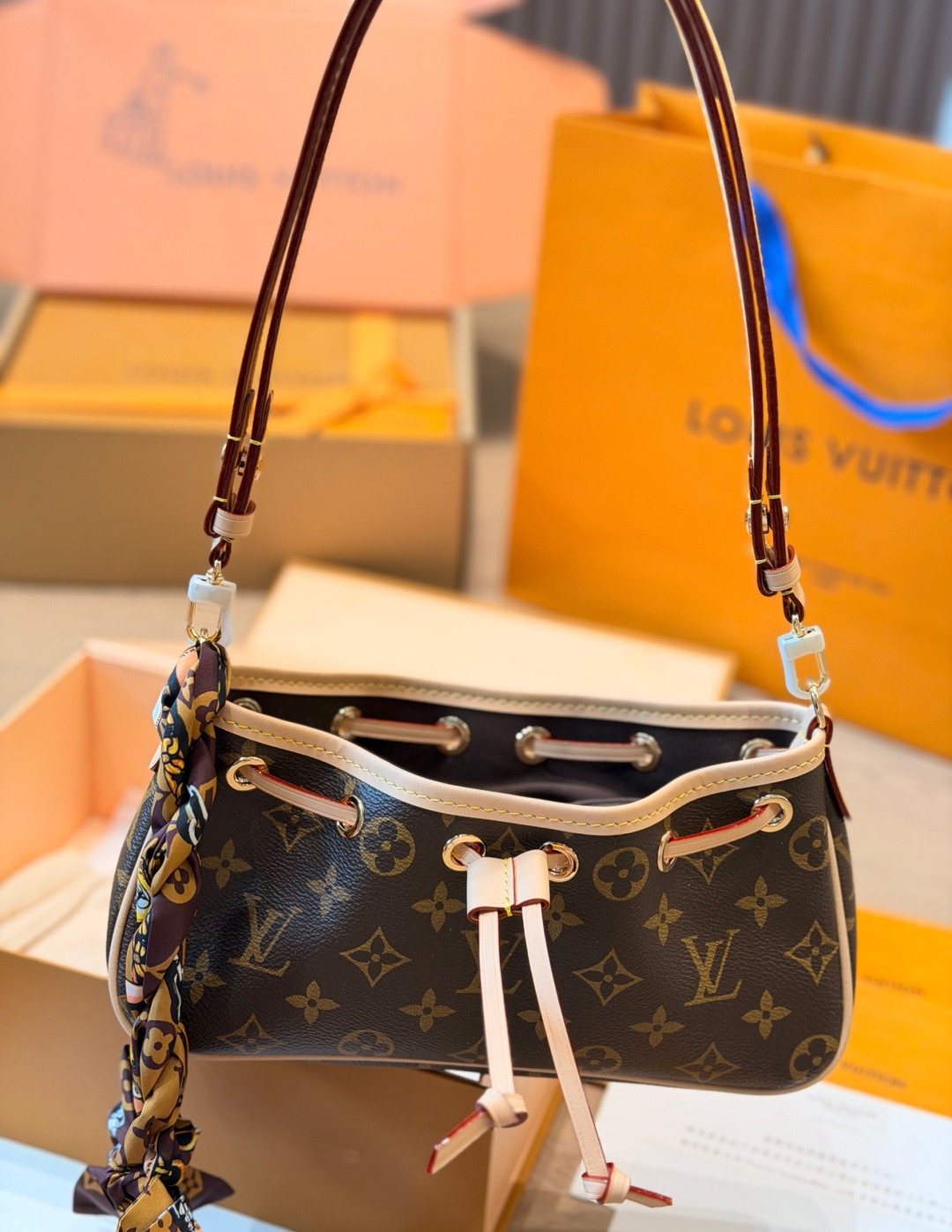 Louis Vuitton Nano Frivole Monogram Drawstring Handbag — front